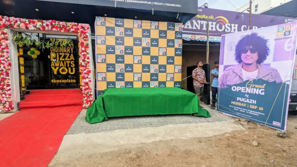 Grand opening ceremony decoration with balloon arch, floral setup, ribbon cutting arrangement, welcome entrance, and elegant event styling by Joyful Knots Events